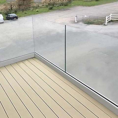 Rock Solid Heavy Duty Aluminum Glass Spigot Clamps For Pool Fencing And Deck Guardrails Silver Finish installed on a balcony.