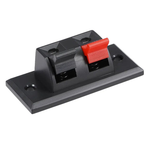Pro Grade Spring Loaded Speaker Terminal Blocks Featuring Slick Push Release Connectors For No Sweat Custom Audio Wire Hookups And Rock Solid Dual Pin Jack Wiring, black terminal block with red and black connectors.