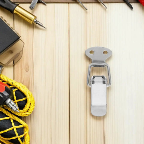 Stainless Steel Spring Loaded Toggle Latch Clasp Buckle Set For Travel Bags And Storage Boxes With Easy Install And Versatile Outdoor Use That Hits The Spot In Silver on wooden surface with tools.