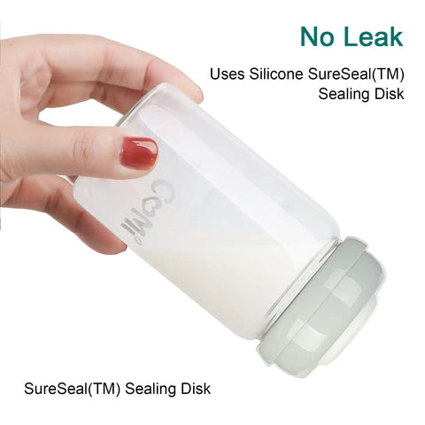 Wide Neck Glass Breastmilk Collection And Storage Bottle Four Pack Six Ounce with Silicone SureSeal Sealing Disk in hand.