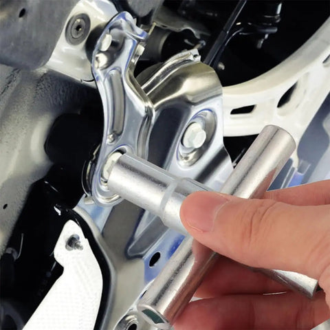 Heavy Duty Folding Socket Wrench Set Featuring Four Precision Cut Openings For Tight Squeezes And Faucet Repair Solid Steel Construction being used on a plumbing fixture.