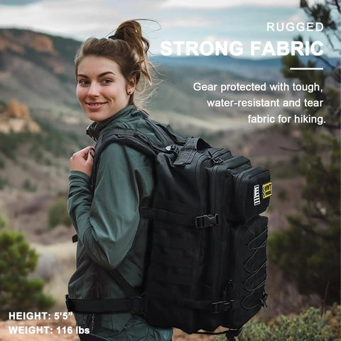 Woman hiking outdoors wearing a Tactical Backpack For Work And Outdoors, 40L Heavy Duty Rucksack With MOLLE, black color.
