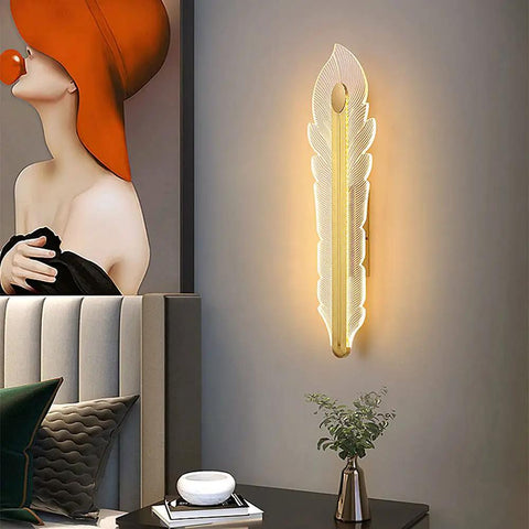 Hella Smooth Game Changing Geometric LED Wall Sconce With Dope Phoenix Tail Design And Acrylic Shade mounted beside gray bed.