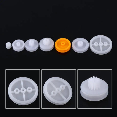 Seven Piece Dope Plastic Pulley Kit For DIY Belts And Model Making, 2A 2B Shaft Fit For 2mm Axle, showing various pulley sizes.