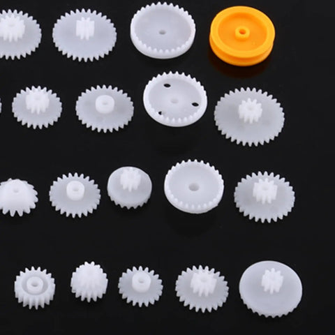 Plastic Gears Kit For DIY Animatronics And Robotics Projects, Double Gear Motor Set With 64 Parts displayed on black surface