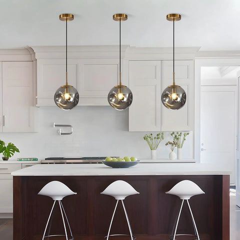 Brass Gold Globe Pendant Light Lit With Smoke Gray Glass Shade Mid Century Modern Ceiling Hanging Fixture One Light Large Pendant For Kitchen Island Dining Room Chandelier Contemporary Living Room Lighting above kitchen island