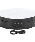 Upgrade Your Game With This Sick Electric Rotating Display Stand Boasting 3 Speeds And 4 Adjustable Angles For Showcasing Jewelry Watches And Cosmetics Like A Boss On A Sleek Black Mirror Surface Turntable Base - black turntable base with USB power.