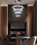 LED Crystal Chandelier With 4 Ring Design in dining room, modern stainless steel pendant light, adjustable length, cool white light