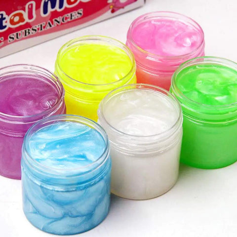12 Pack 4 Oz Clear Plastic Sample Jars With Heavy Duty Black Screw Top Lids Super Portable Travel Cosmetic Storage Containers filled with colorful creams.