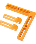 Dead On Precision Cnc Workpiece Positioning Fixture With T Slot Perforated Table Vise Clamps And Knockout Repeatable Side Clamping Rig, orange aluminum square with clamps.