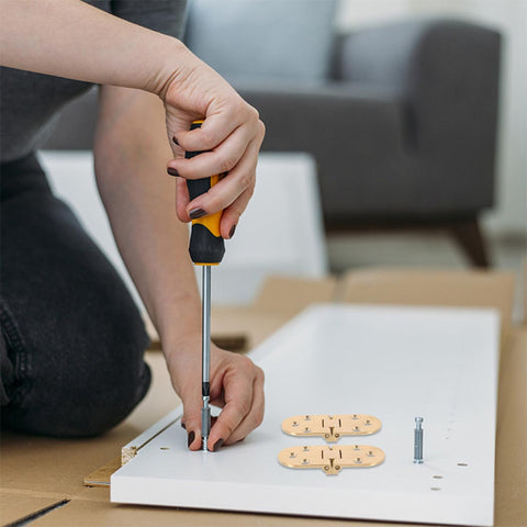 Installation process of Brass Folding Table Hinge With Round Edges Heavy Duty Desk Hinge for DIY assembly on a white board.