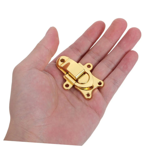 Classic Antique Golden Toggle Latch Zinc Alloy Duckbilled Hasp Lock For Toolbox Guitar Case Jewelry Box Vintage Storage Solutions held in hand.