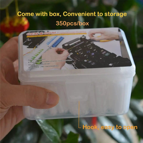 Hand holding box of Pro Grade Ribbon Mass Fiber Optic Fusion Splice Sleeve 40mm Heat Shrink Tube For Ribbon Cables 350 pack