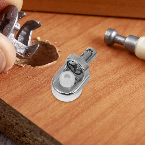 Close-up of 24 Pack Zinc Alloy Shelf Support Pins For Stable Shelf Placement And Beefy Cabinet Support Easy To Install on wood