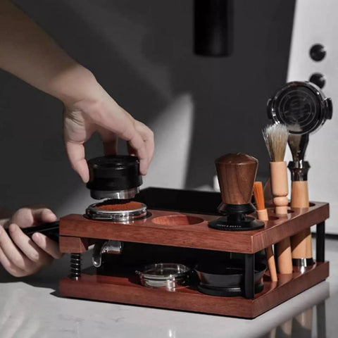 Solid Walnut Coffee Tamping Station And Espresso Knock Box Featuring Double Layer Accessory Storage Fits 51 54 58mm Portafilters, shown in use.