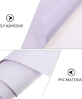 Close-up of Premium White Peel And Stick Waterproof Wallpaper For Cabinets And Showers Heavy Duty PVC Self Adhesive Sheet, showing self-adhesive backing.