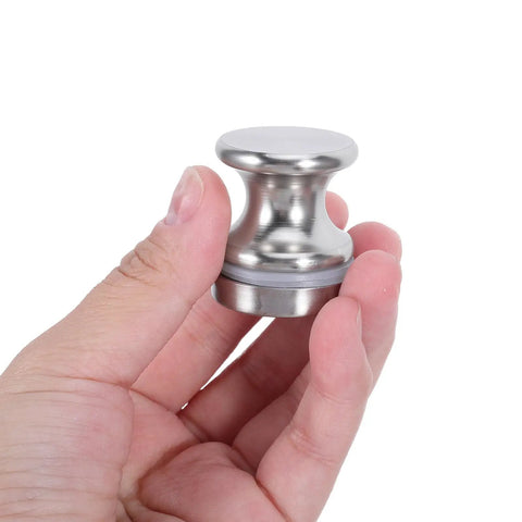 Hand holding Two Pack Glass Shower Door Handles For Homes And Offices Silver Aluminum Alloy Round Single Hole Mount Heavy Duty