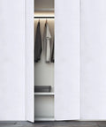 Self Adhesive Waterproof Pvc Wallpaper Roll For Peel And Stick Cabinet And Wardrobe Upgrade on a sleek white cabinet with clothes.
