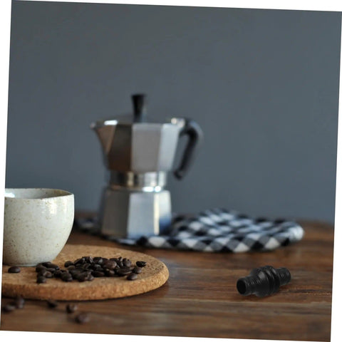 Espresso Steam Wand Sleeve Heatproof Rubber Insulation Cover For Coffee Machines on table with moka pot and beans