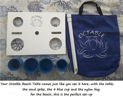 Portable Beach Table With Two Phone Slots, Lightweight Yet Sturdy And Durable, Must Have For Beach, Boat, Pool, Backyard, RV And Camping, Keeps Drinks And Phones Off The Sun With Built In Tray For Stash And Gear, shown with sand spike, cups, and bag.