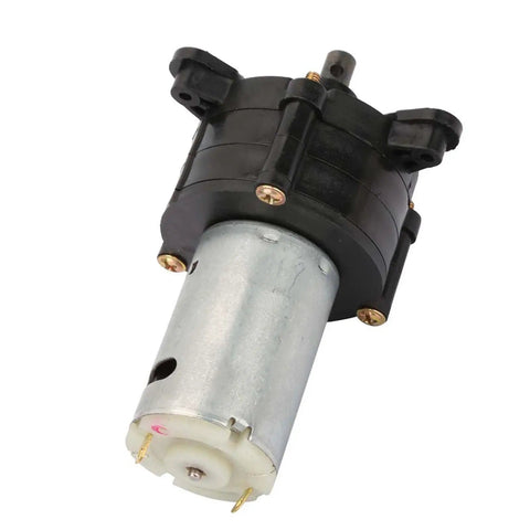 Black and metallic cylinder of the Hand Cranked Hydraulic Power Generator Mini Dynamo 5V 24V Adjustable Output Up To 20W Portable Metal Body