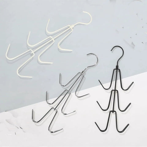 2 Pack Closet Purse Hangers, Game Changer Handbag Organizer Rack, rotating multi strap backpack hooks in silver, white, and black.