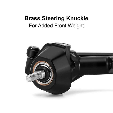 Close-up of brass steering knuckle from 3mm Planet Axles With Brass Steering Knuckles For 1/30 Scale Axial SCX30 RC Crawler Upgrade Kit.
