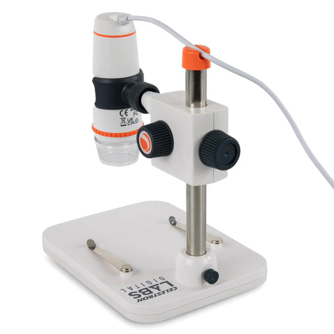 5MP Handheld Digital Microscope With 20X To 200X Magnification And True IR Cut Lens For Clear Detail On Coins, Circuits, Textiles, Insects And More, High Resolution Images And VGA Video. White handheld microscope on stand with USB cable