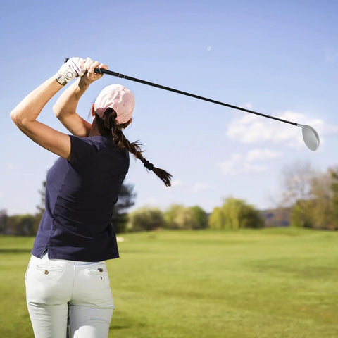 Woman swinging Women's 460cc Golf Driver With Graphite Shaft, Lightweight Right-Handed Single Club With Head Cover on course