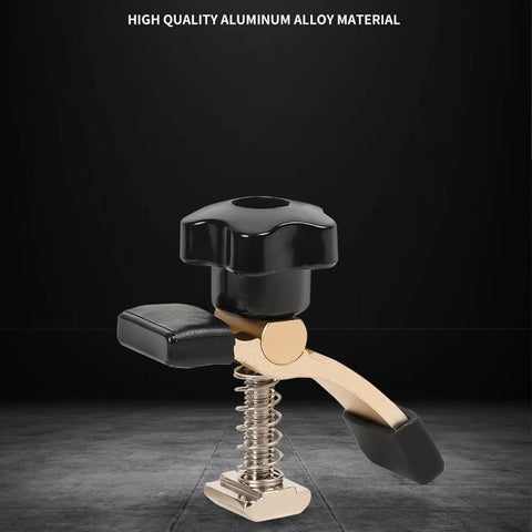 Close-up of aluminum alloy Router Clamping Kit with T Track Hold Down Clamps for Engraving Machines on perforated grid tables.