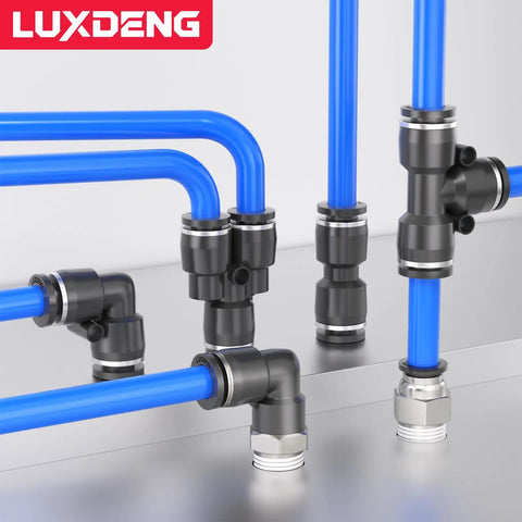 Five Sixteenths OD To One Quarter NPT Thread Male Elbow and Straight Quick Connect Air Fitting in pneumatic setup.