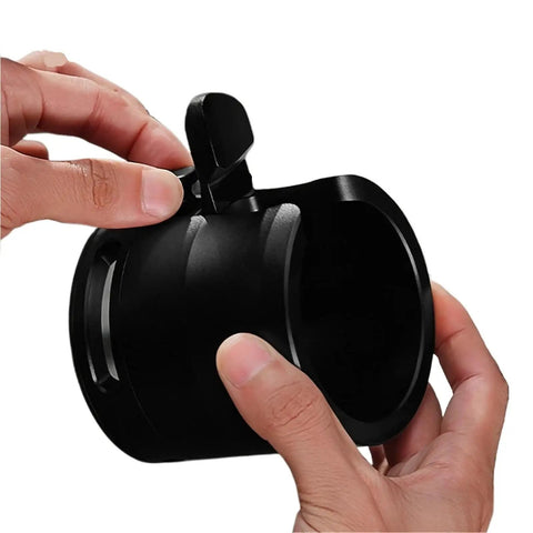 Legit Reliable Adjustable Espresso Tamper Station With Grippy Silicone Bottom And Raised Frame To Hold Back Spilled Grounds, showing hand adjusting functional lever.