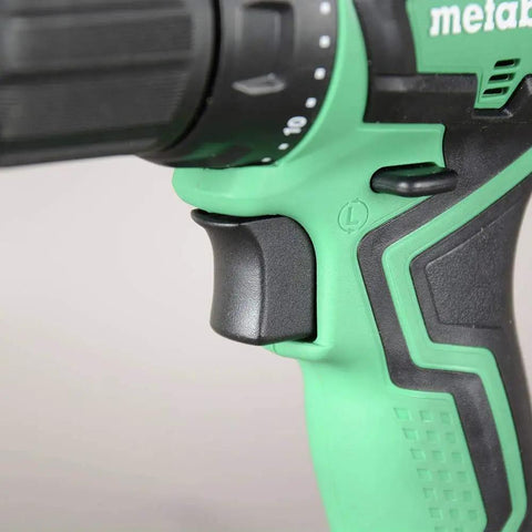Close-up of Beast Cordless Drill 18V One Half Inch Subcompact Brushless Driver handle and trigger in green and black.