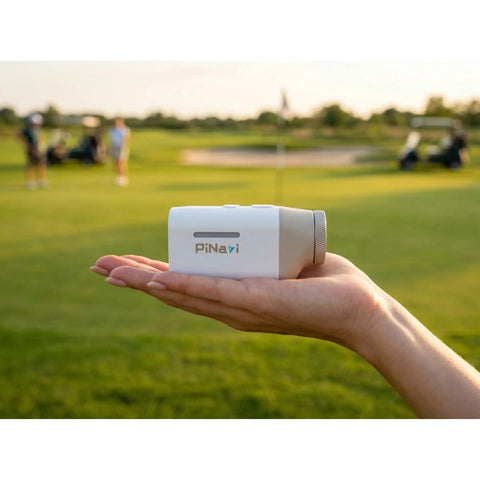 Killer Compact Golf Rangefinder With Slope Mode And Flag Lock Vibration, Dead Accurate One Hand Friendly Build Usb C Rechargeable Magnetic Mount Ace Your Round Waterproof Easy Carry held in hand on golf course.