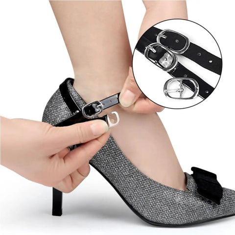 Hand adjusting an adjustable anti-drop shoe strap on a black high heel, showcasing durable metal and PU materials.