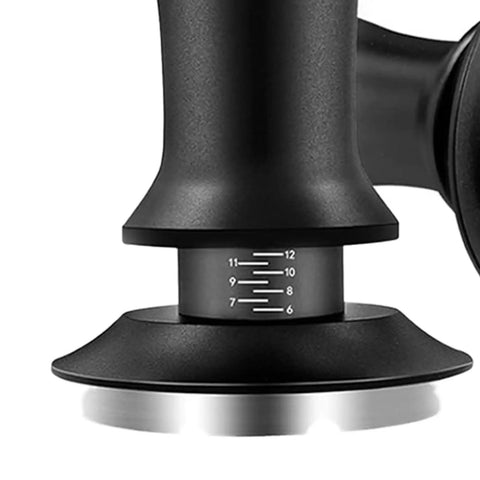 Close up of black seven piece espresso tamper kit designed for 51mm filter cups with measurement scale for precise brewing.