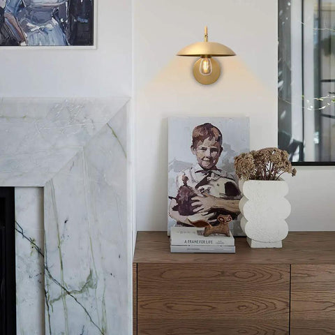 Room with Dope Industrial Swing Arm Wall Sconce In Brass Finish Adjustable Hardwired Wall Lamp over a dresser with art
