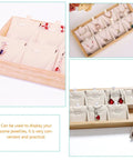 Retro Wooden Jewelry Organizer Tray With Eight Grids To Keep Your Bling Slick And Prevent Tangles While Displaying Necklaces And Earrings On Any Desk Surface, showing earrings in beige segments.
