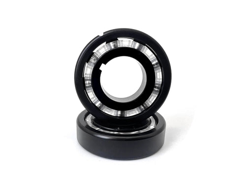 Turbine bearing for pool vacuum cleaner, black outer ring with silver inner race, front view
