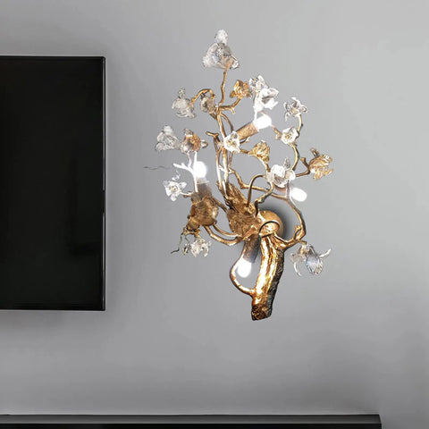 All Copper Postmodern Wall Lamp Featuring Sparkling Crystal Kapok Accent For Bedroom Or Hallway mounted beside a TV.