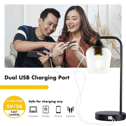 Cozy Industrial Table Lamp For Living Room With 2 USB Ports, Black Nightstand Lamp, Clear Glass Shade shown charging devices.