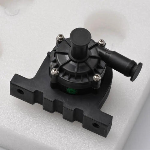 Compact Pwm Water Pump 12 Volt Electric Coolant Circulator for No Sweat Engine Bay Cooling, black plastic pump on foam.