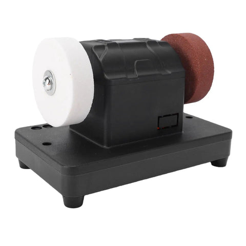 Built Like A Tank Three Inch Mini Bench Grinder With Adjustable Variable Speed From 2000 To 6000 Rpm And A Zero Drama Cordless Copper Motor Design For Daily Tasks on a sturdy black base.
