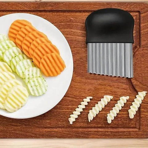 Crinkle cutter knife, top-view, upgraded stainless blades and black handle; shown with crinkle-cut veggies.