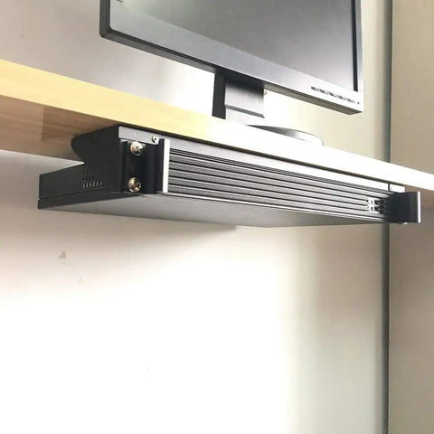 Ready To Roll 1U Vertical Wall Mount Rack For 19 Inch Network Gear mounted under a shelf, showcasing its compact design and steel bracket.