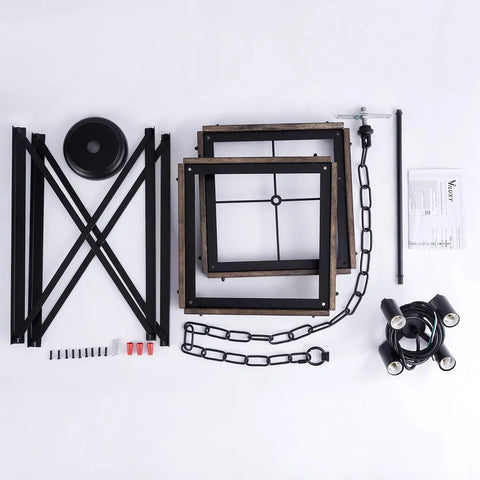 Components of Four Light Wood Grain Black Cage Pendant Lamp for Kitchen Island and Dining Room spread out on surface