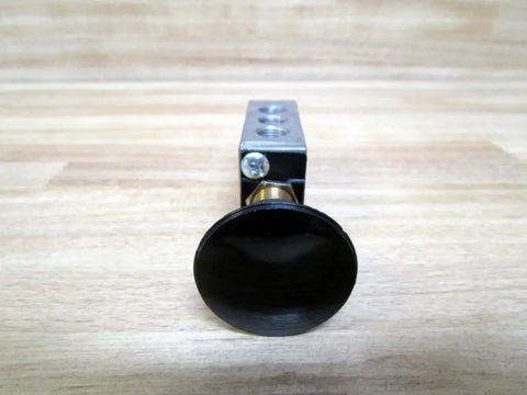 One Eighth Inch Inlet Two Position Mechanically Operated Valve With Four Way Control And Palm Actuator front view showing black palm actuator.