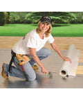 Person installing Peel and Seal Self Stick Roll Roofing Aluminum 36 Inch Wide Durable Self Adhesive Roofing Material For Quick Patches