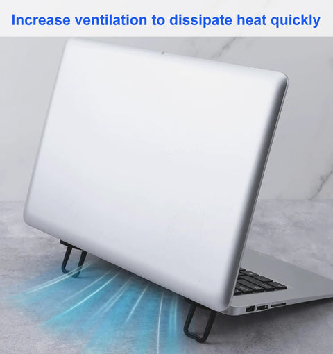 Laptop on desk with Two Pack Keyboard Riser With Dual Tilt Angles, showing increased ventilation for heat dissipation.