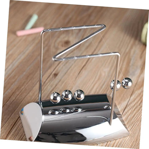 Z Shape Desktop Pendulum Balls Toy For Newtons Cradle Learning Five Ball Physics Experiment Kit on wooden desk